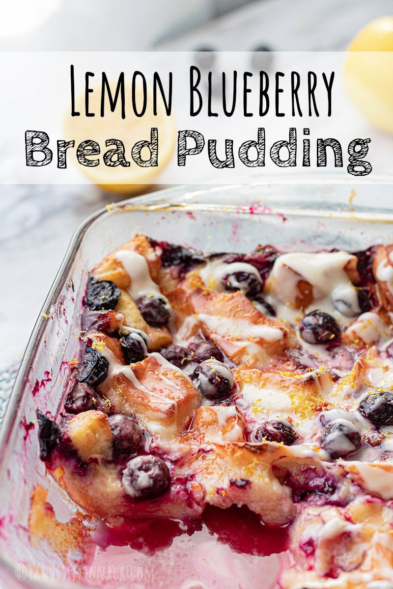 Baked Bread Pudding in glass pan wtih blueberries and lemon. 