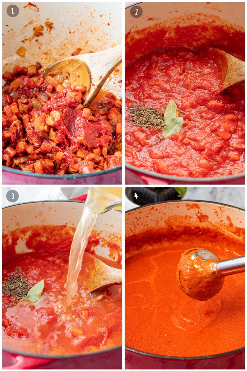 Process of making homemade tomato soup, cooked onions carrots and bacon with tomato paste, adding whole peeled tomatoes, adding chicken broth, blending with immersion blender. 
