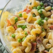Bowl of cold creamy lemon pasta salad.