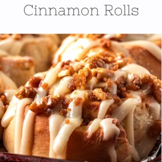 Frosted banana cinnamon rolls in metal pan with text overlay.