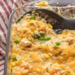 Baked Chicken and rice casserole in glass baking dish.
