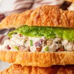 Assembled cranberry chicken pecan salad on croissant.