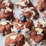 Hardened chocolate on blueberry yogurt clusters.