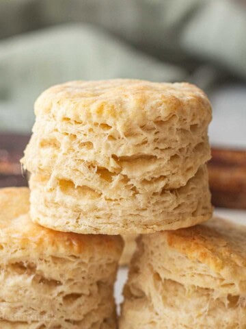 Stack of baked sourdough biscuits.