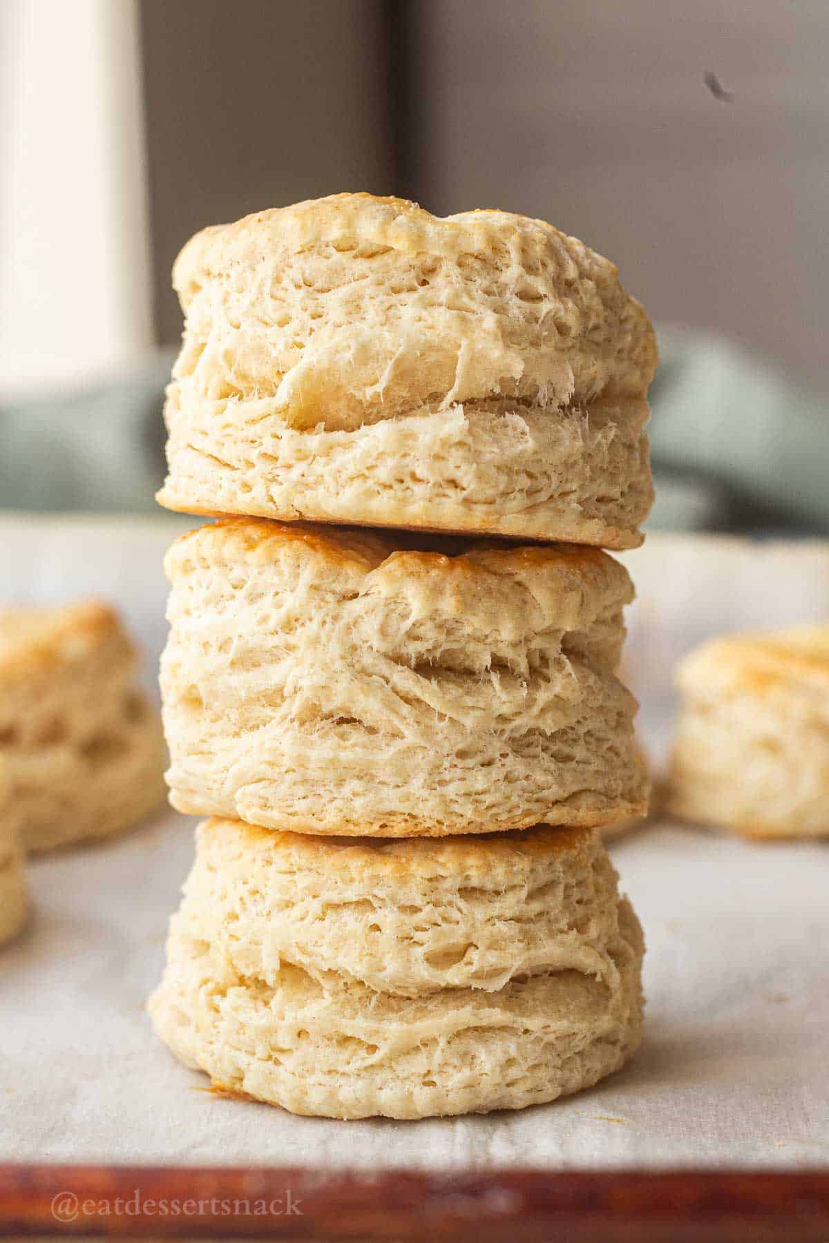 Stack of baked sourdough biscuits.
