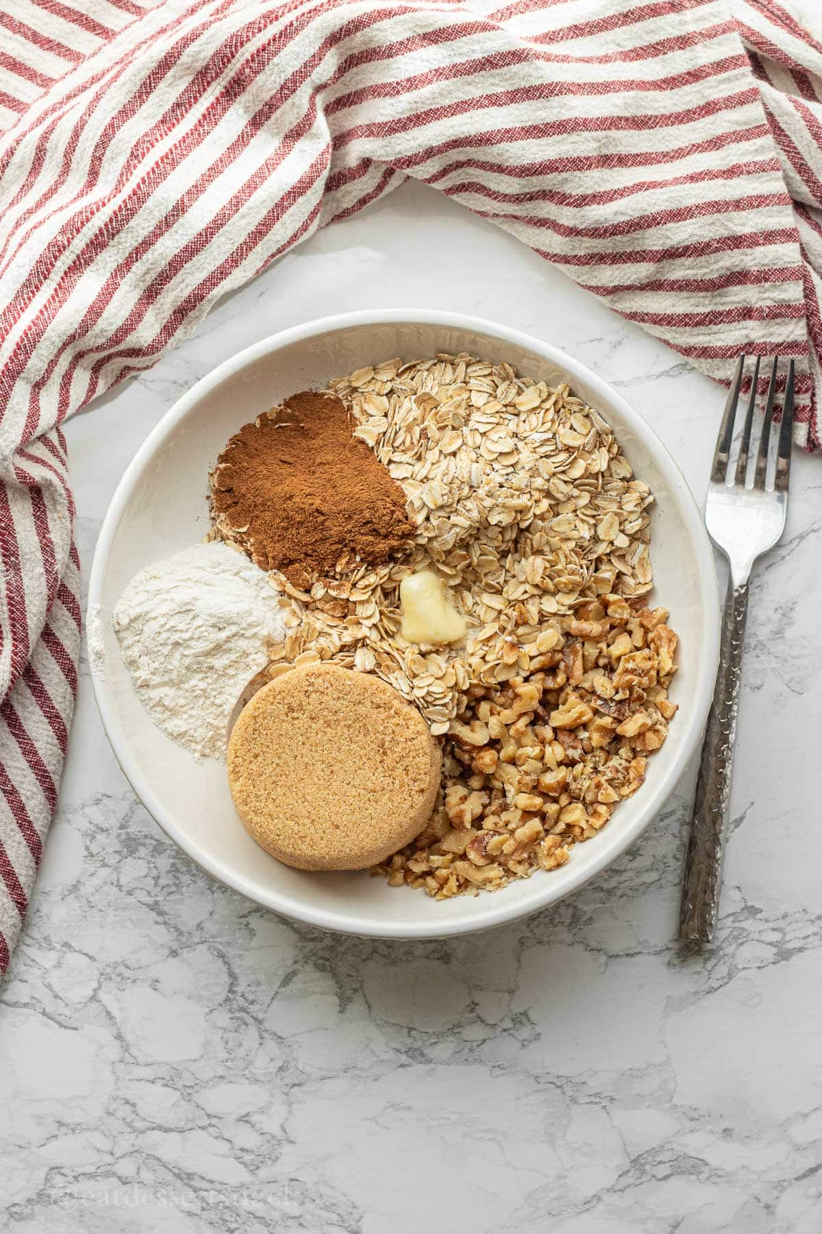 Walnut cinnamon streusel ingredients in bowl.
