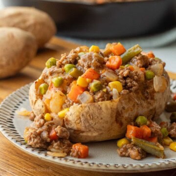 Shepherd's pie filling in baked potato.
