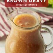 Glass pitcher of gravy.