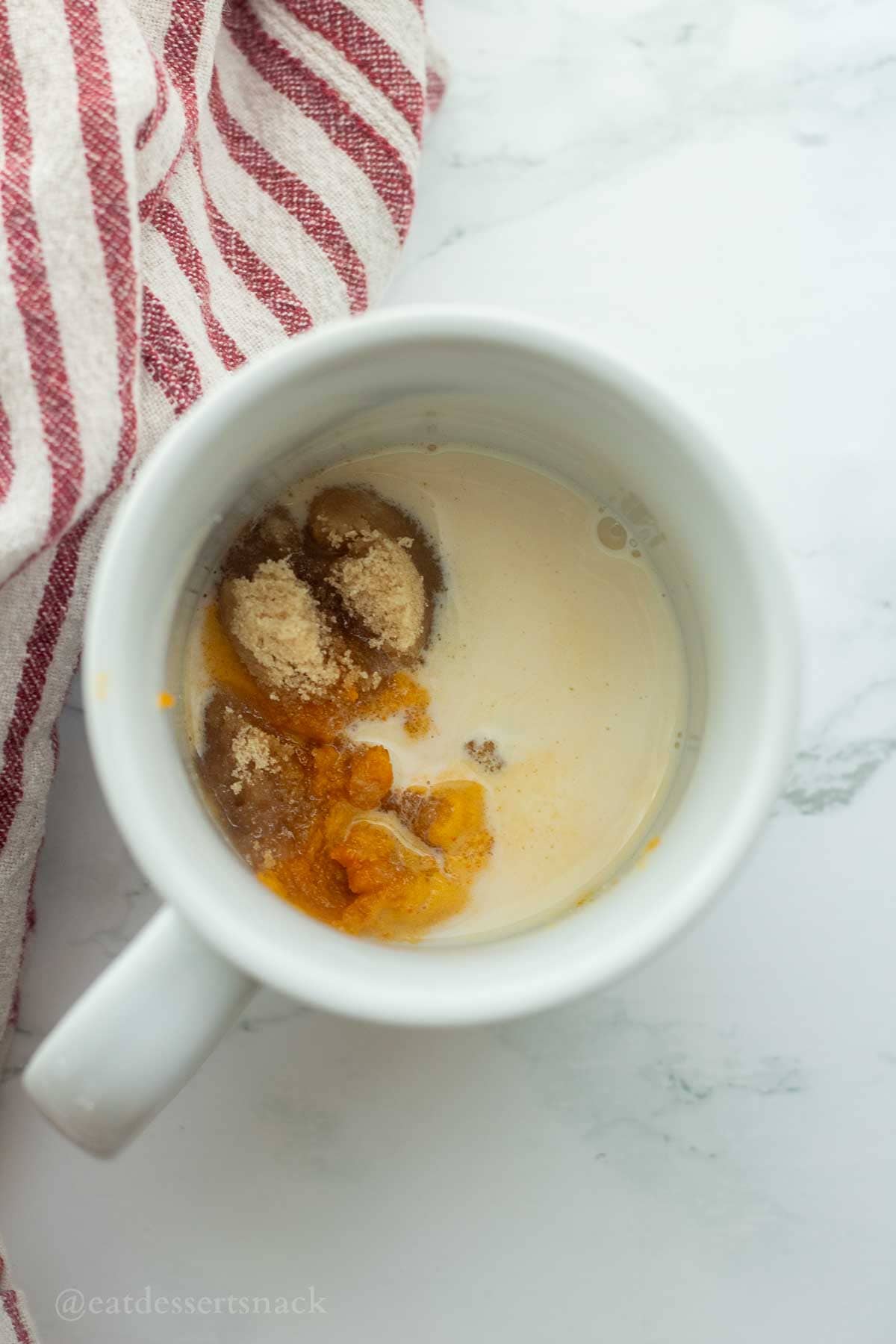 Wet ingredients in mug.