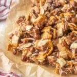 Chocolate Chex mix on parchment paper.