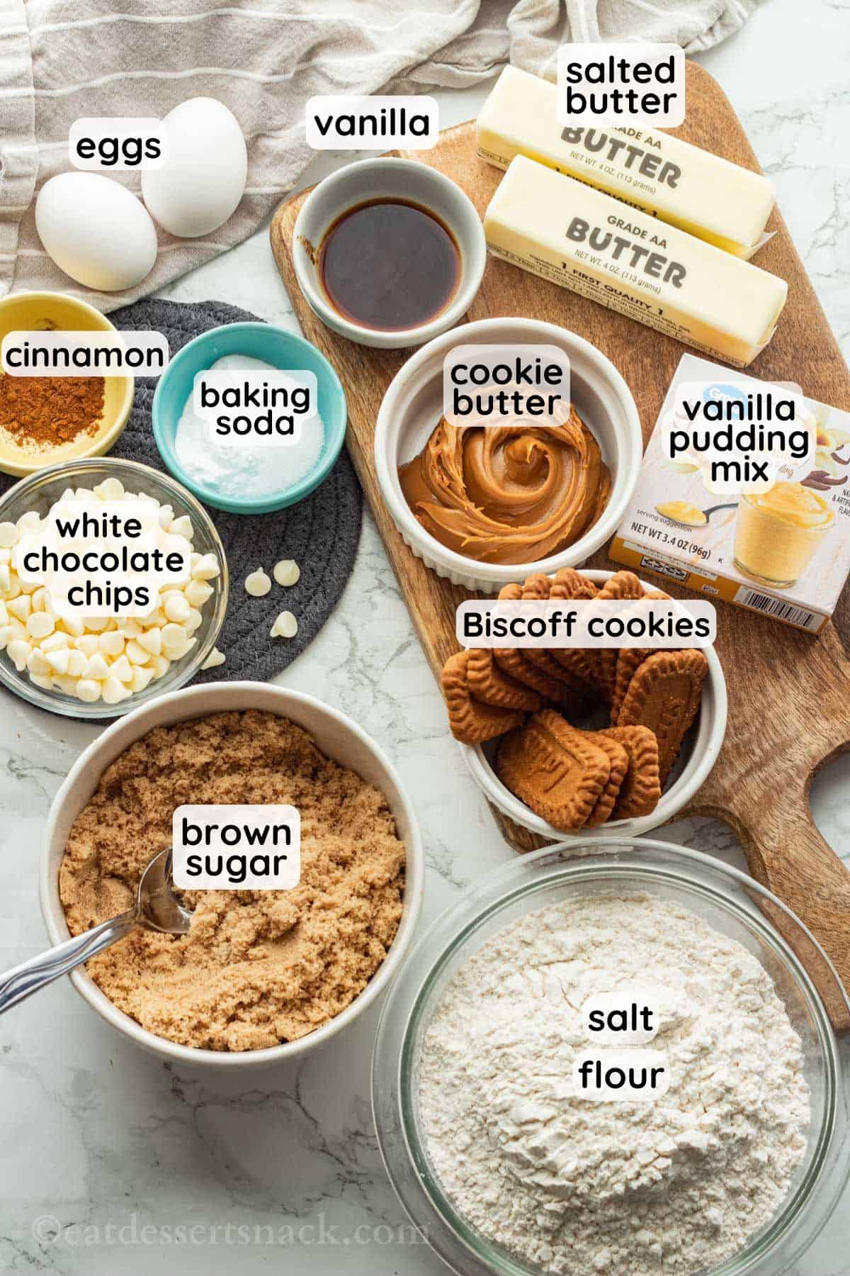 White Chocolate Biscoff Cookies ingredients labeled in bowls.
