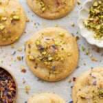 Baked baklava cookies on parchment paper.
