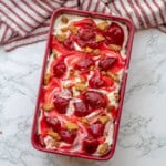 Strawberry cheesecake ice cream in a pan.