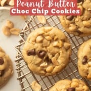 Baked Peanut butter cookies on metal cooking rack.