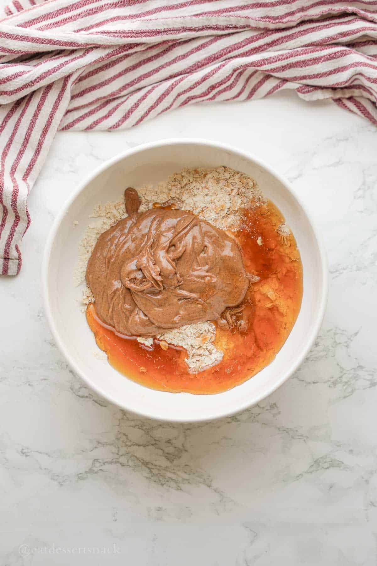 Almond butter and honey in bowl.